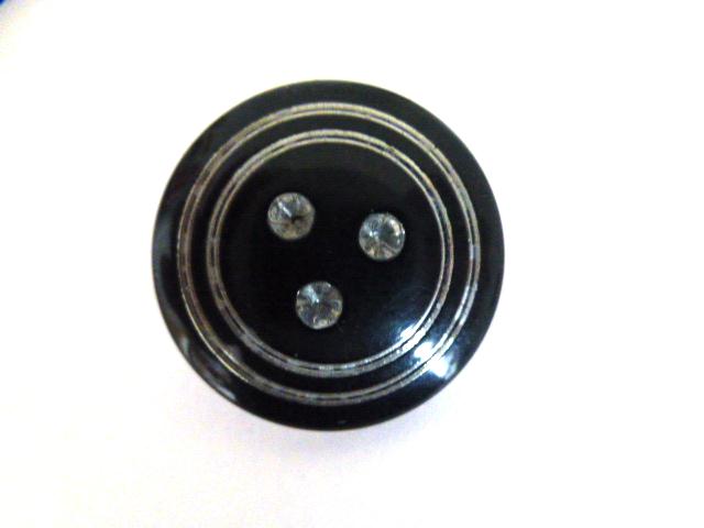 Black and Silver button